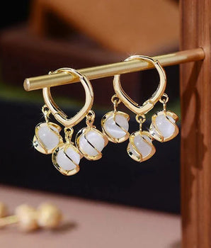 Gold-Toned Hoop Earrings with Dangling White Stone Charms